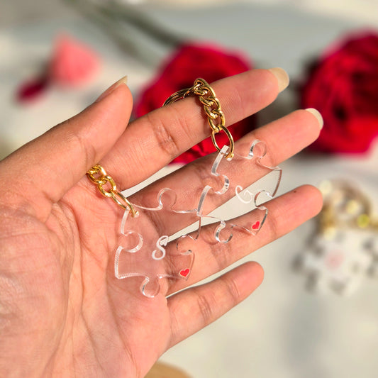 Close-up of personalised acrylic puzzle keychain with initials, cute and elegant keepsake gift