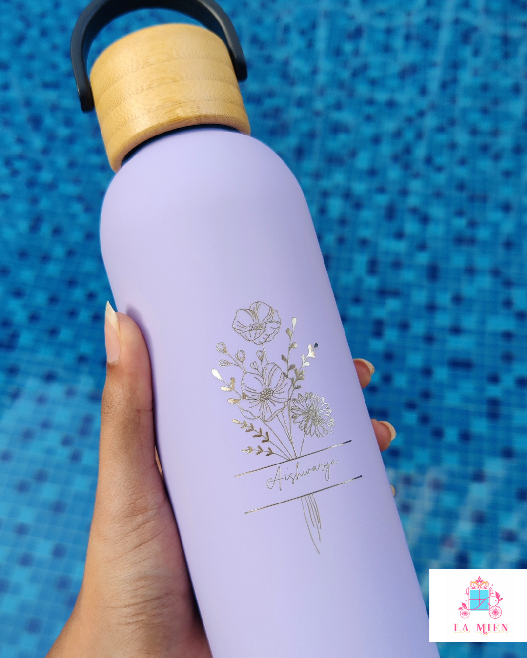Double wall insulated bottle with floral design and carry handle