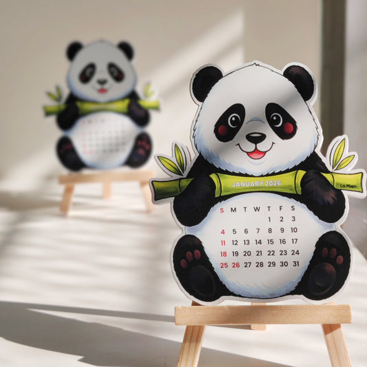 Adorable panda desk calendar styled on an aesthetic workspace, adding a playful and cheerful touch to daily planning.
